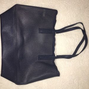 Neiman Marcus perforated scallop bag